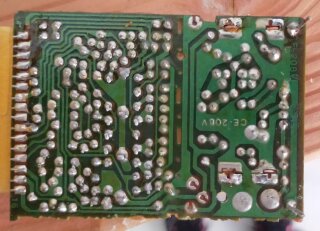 The underside of the RF modulator board with the shielding removed