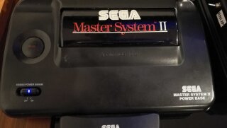 The Master System 2 with a blue power indicator light.