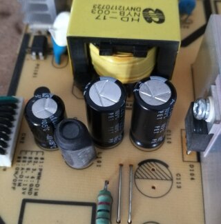 The blown capacitors replaced.